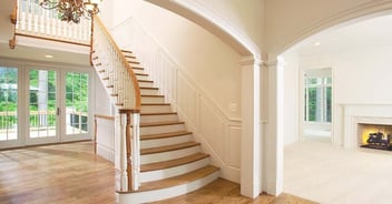 Image of a grand staircase and open entryway in a West Chester, PA home addition by Thompson Communities