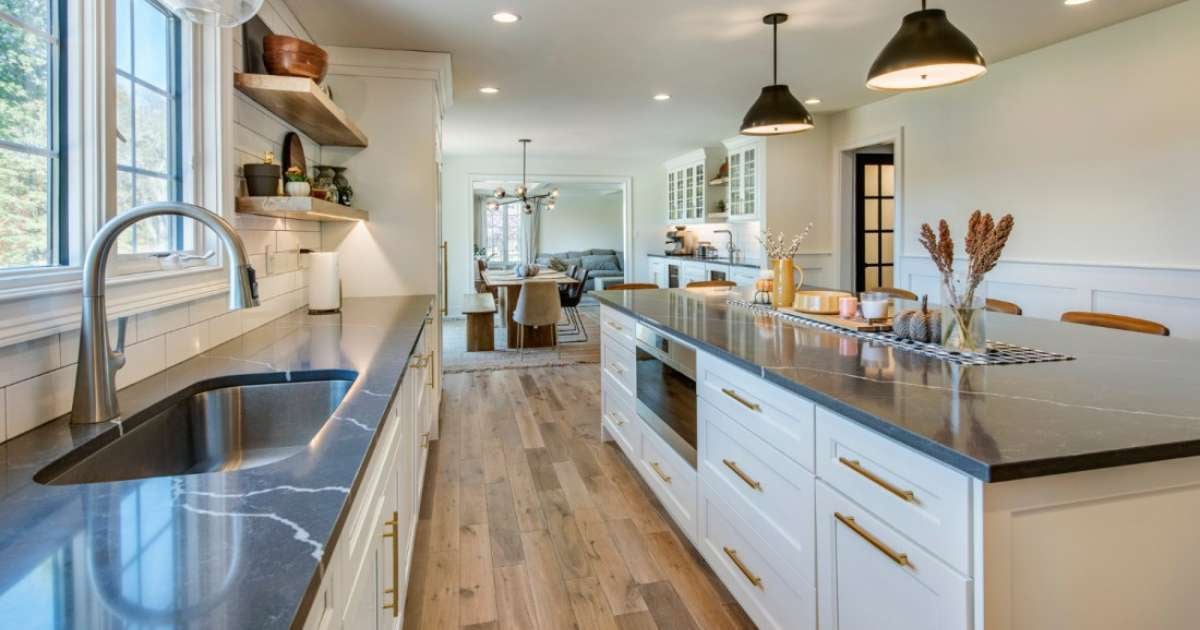 Image of custom kitchen with large island and quartz countertops in West Chester, PA by Thompson Communities Image of custom kitchen with large island and quartz countertops in West Chester, PA by Thompson Communities
