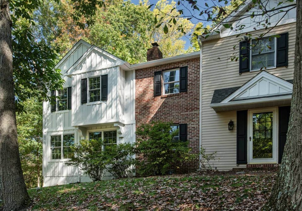 Dual-siding home addition featuring white and brick materials in West Chester, PA by Thompson Communities - home additions costs 2025