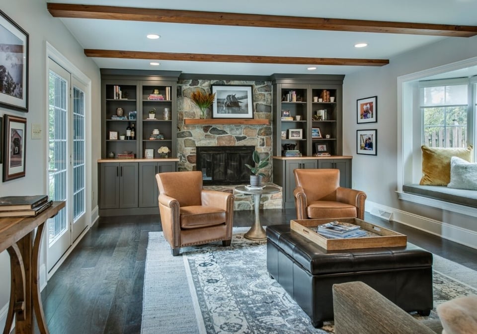 Inviting family room with a stone fireplace in West Chester, PA home addition by Thompson Communities - home additions costs 2025