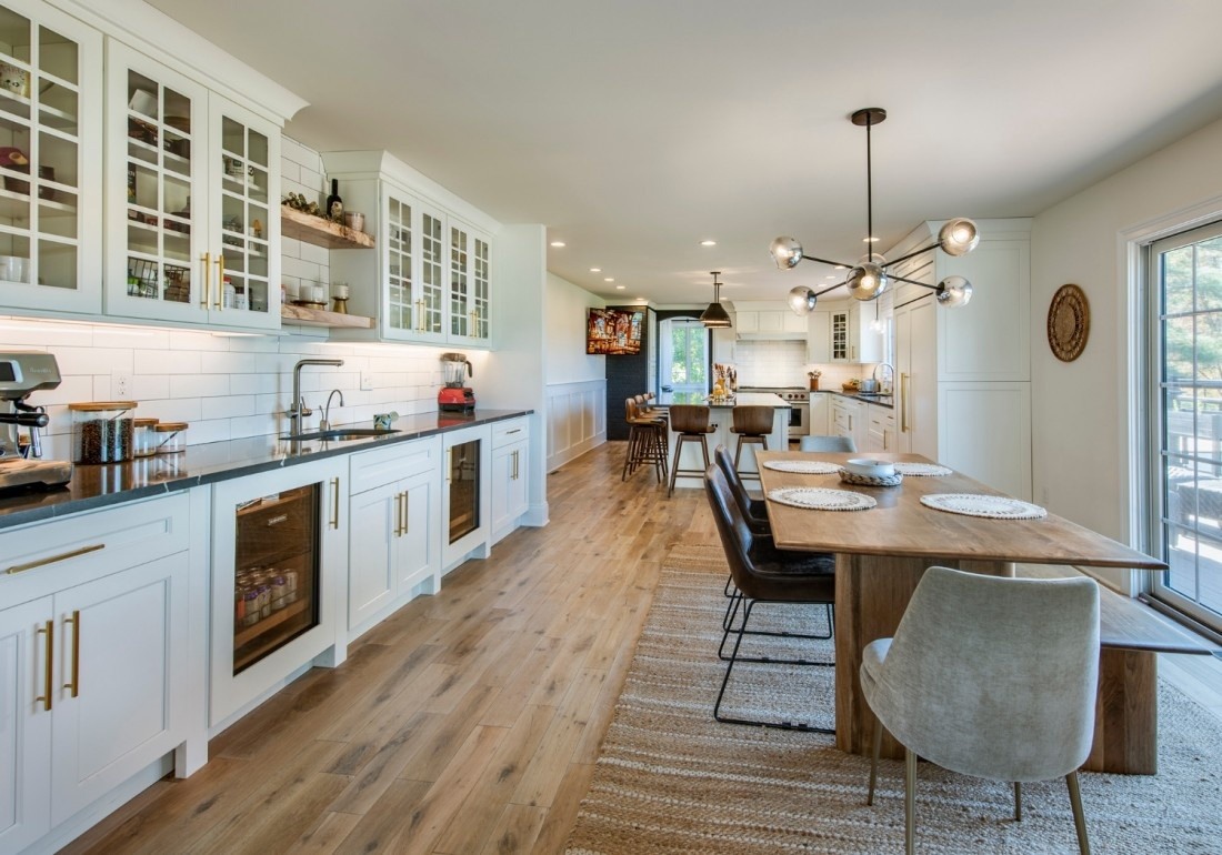 Bright kitchen remodel with white cabinetry and large island by Thompson Communities in West Chester, PA Bright kitchen remodel with white cabinetry and large island by Thompson Communities in West Chester, PA