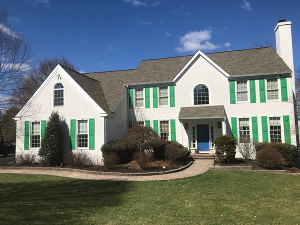 Before Image of Stucco Home Exterior Before Siding Installation by Thompson Communities in West Chester, PA