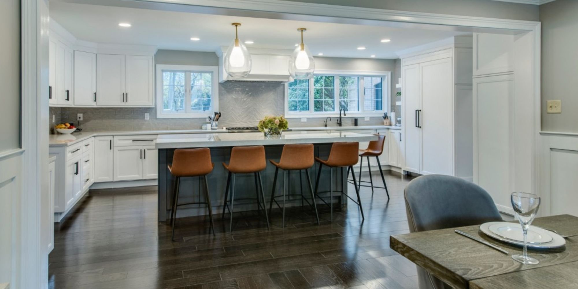 Kitchen in a custom home with a panel refrigerator by Thompson Communities in West Chester, PA
