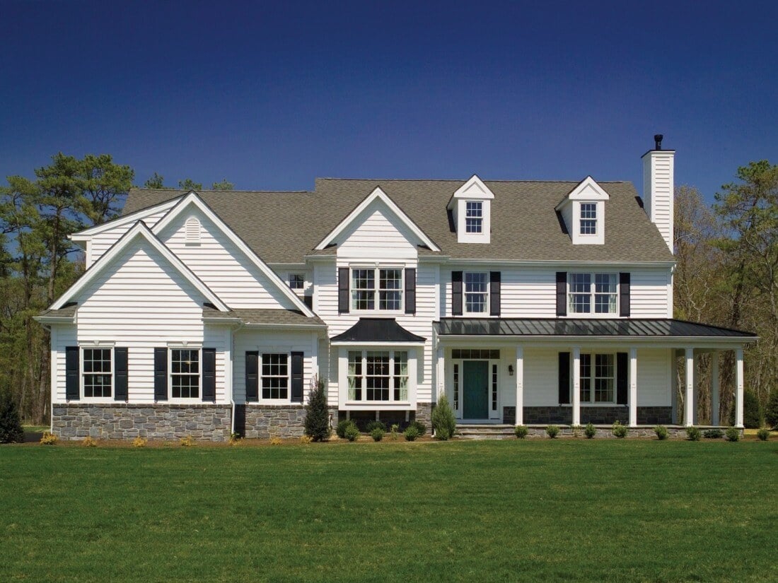 Classic white exterior custom home in West Chester, PA by Thompson Communities, featuring colonial-style details