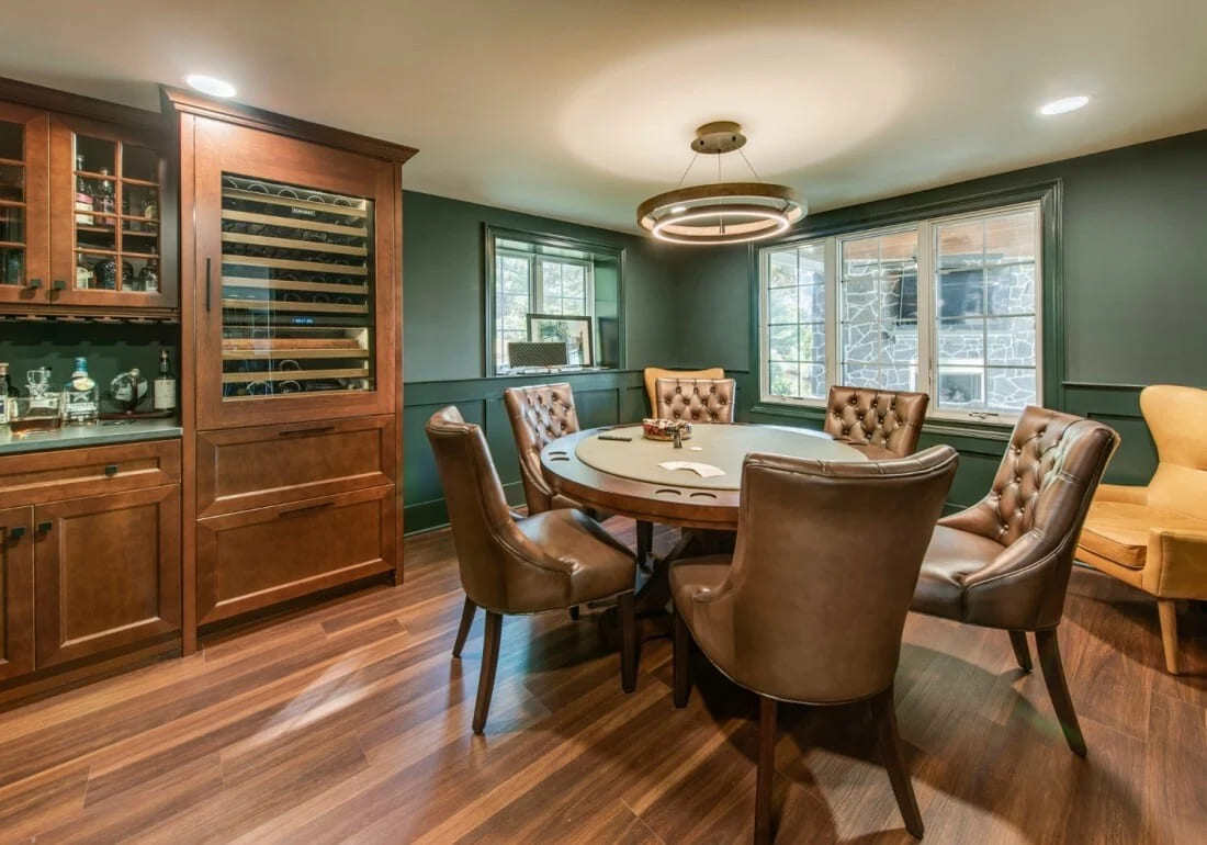 Sophisticated dining room with gray chairs and a modern chandelier, Thompson Communities remodel, West Chester, PA