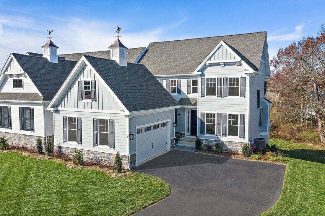 West Chester, PA custom home by Thompson Communities, featuring contemporary design and a paved driveway (1)